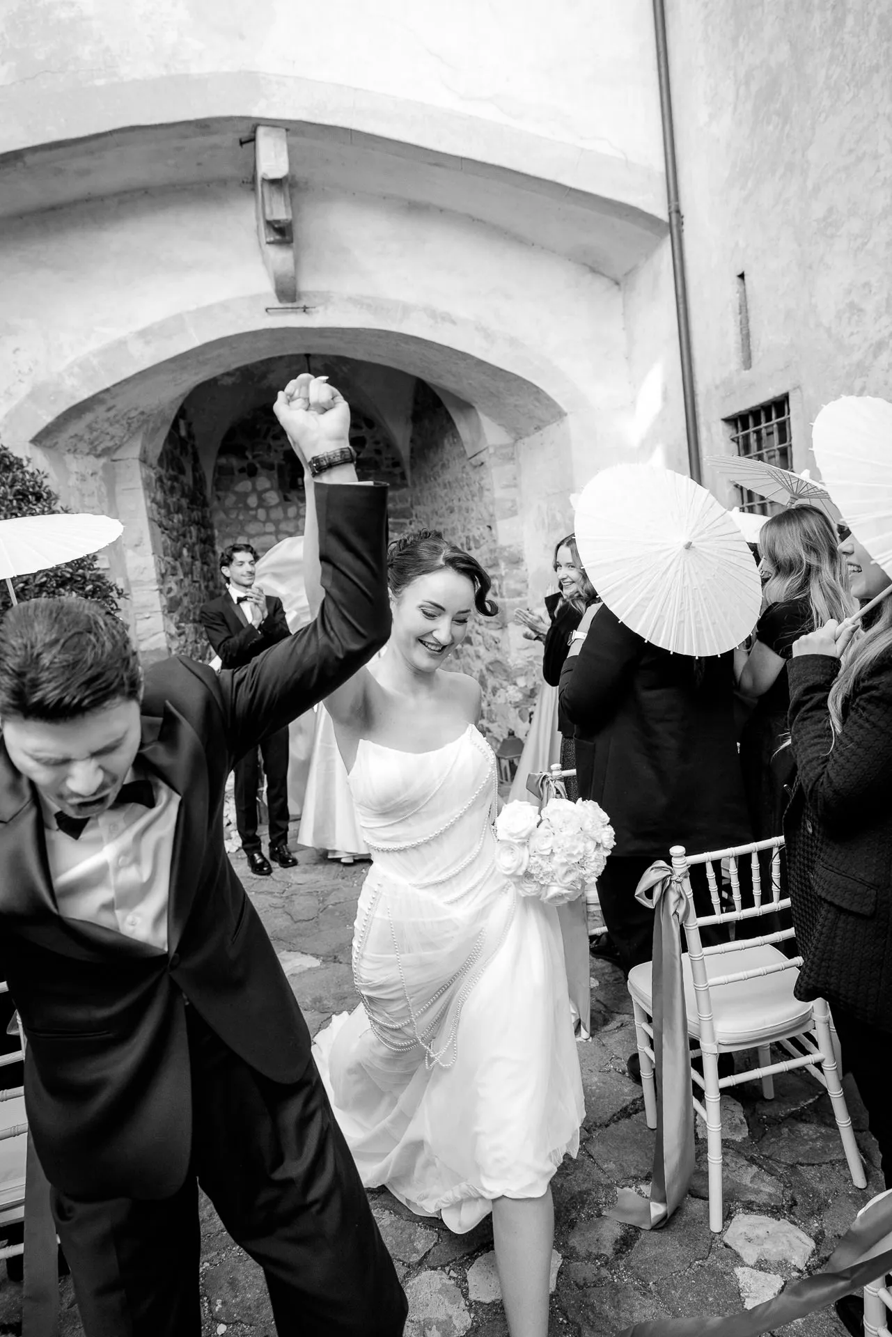 Wedding couple celebrates after ceremony at Schloss Friedberg Tyrol Italian wedding