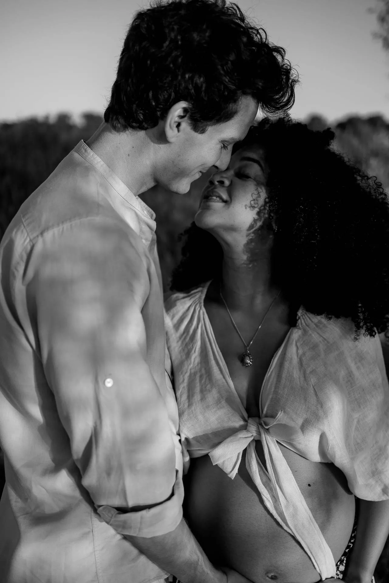 Sensual pregnancy photography in lake Munich evening light