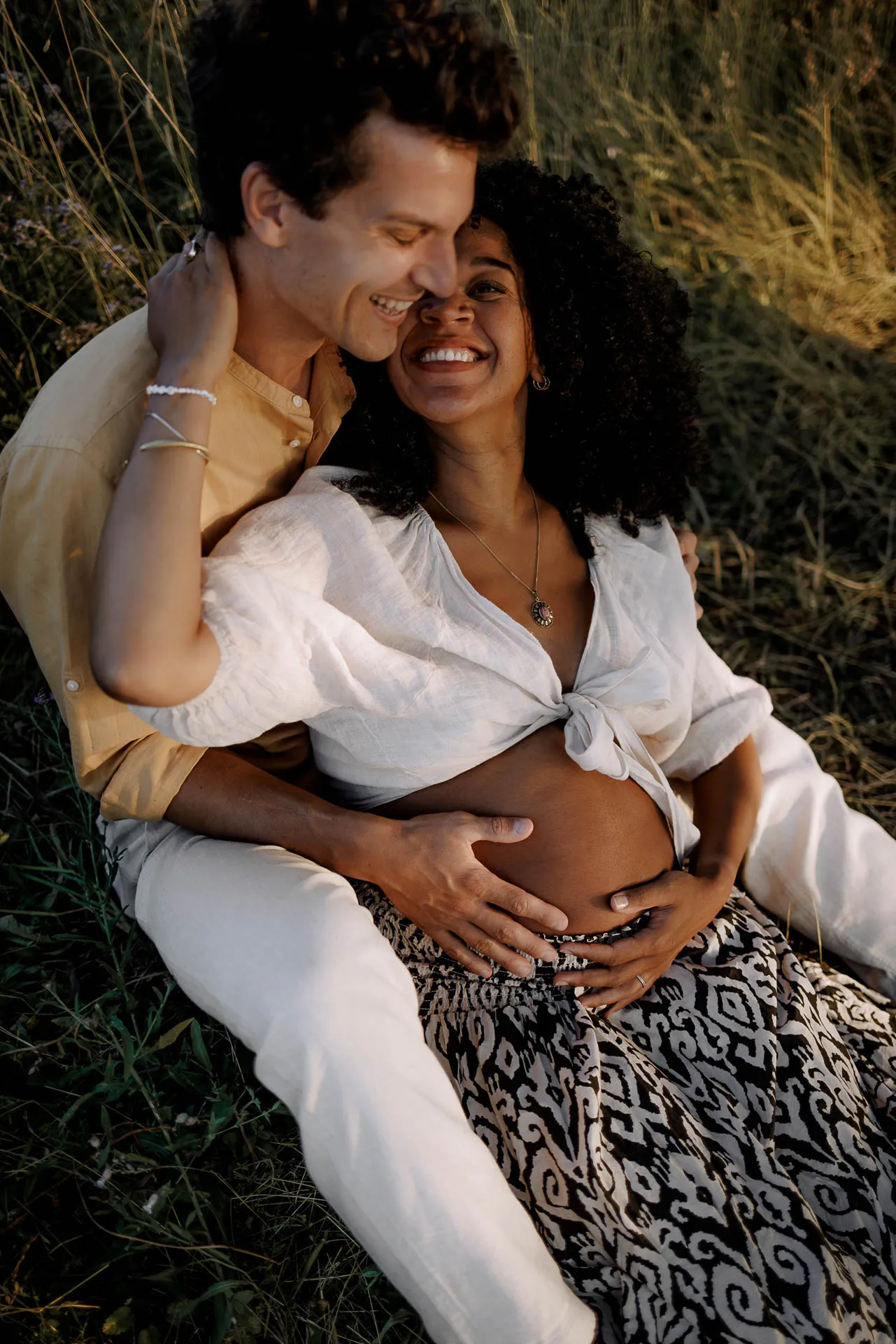 Modern pregnancy water session at sunset Munich