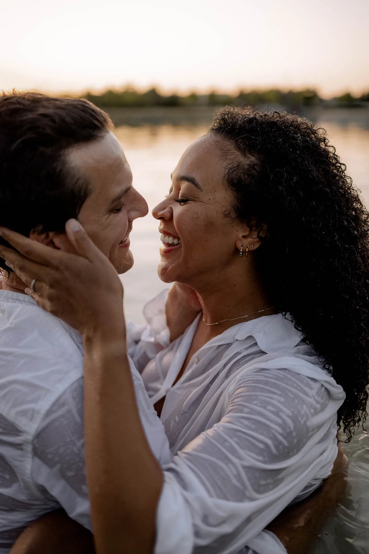 Pregnant woman in water with warm evening light Munich