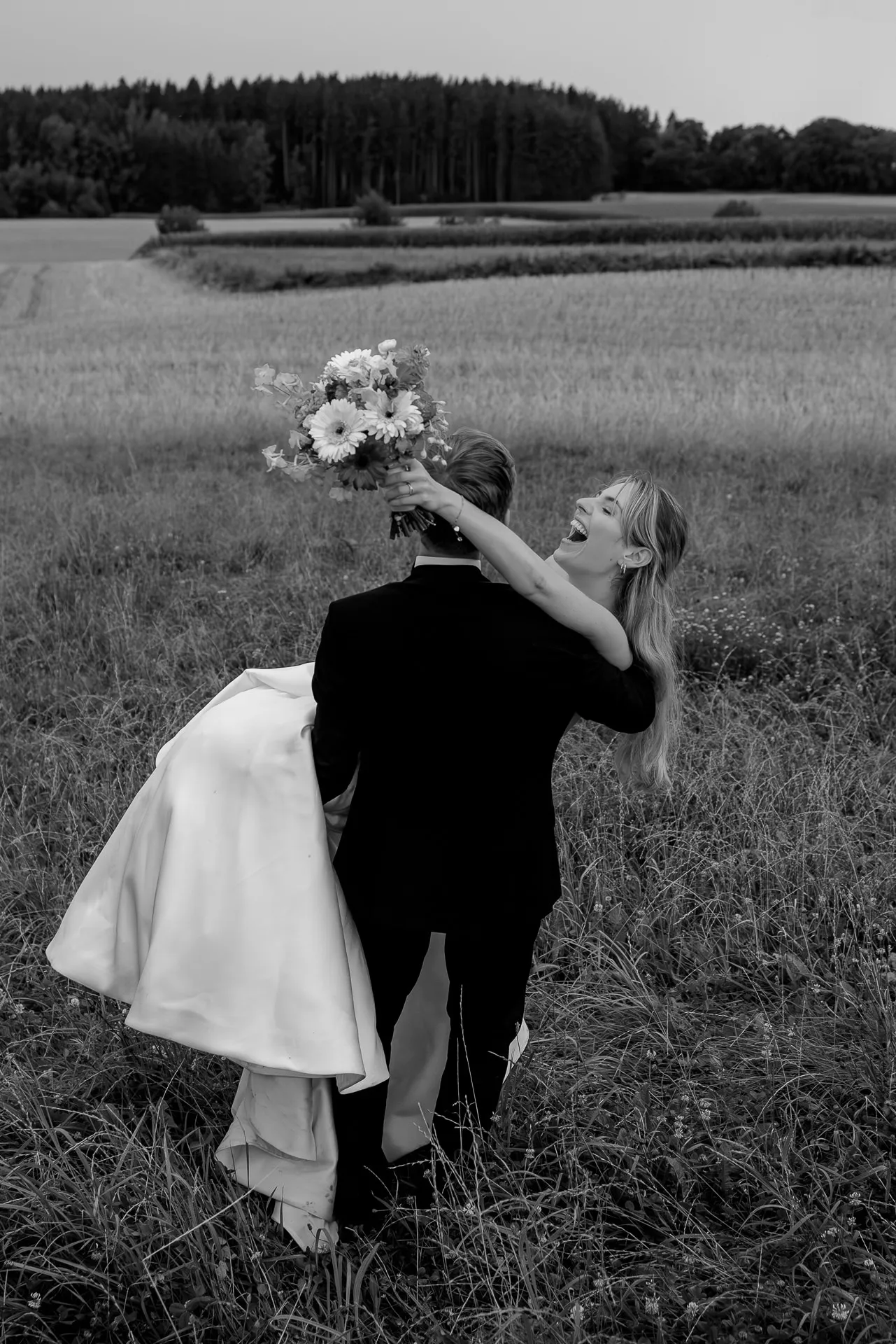 Happy wedding couple in countryside setting at country wedding near Munich