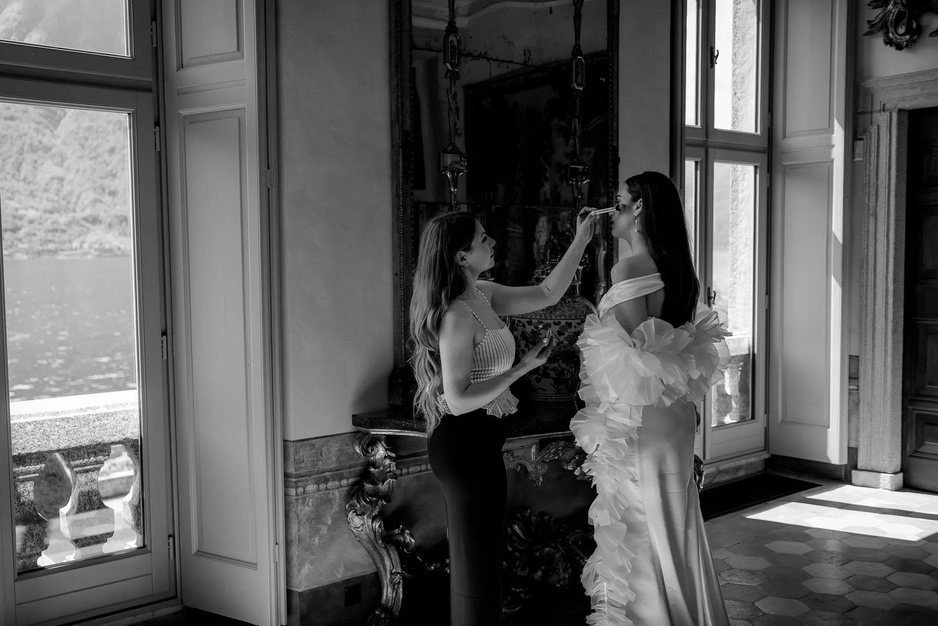 Bridal styling with makeup artist in elegant salon Villa Balbiano black and white
