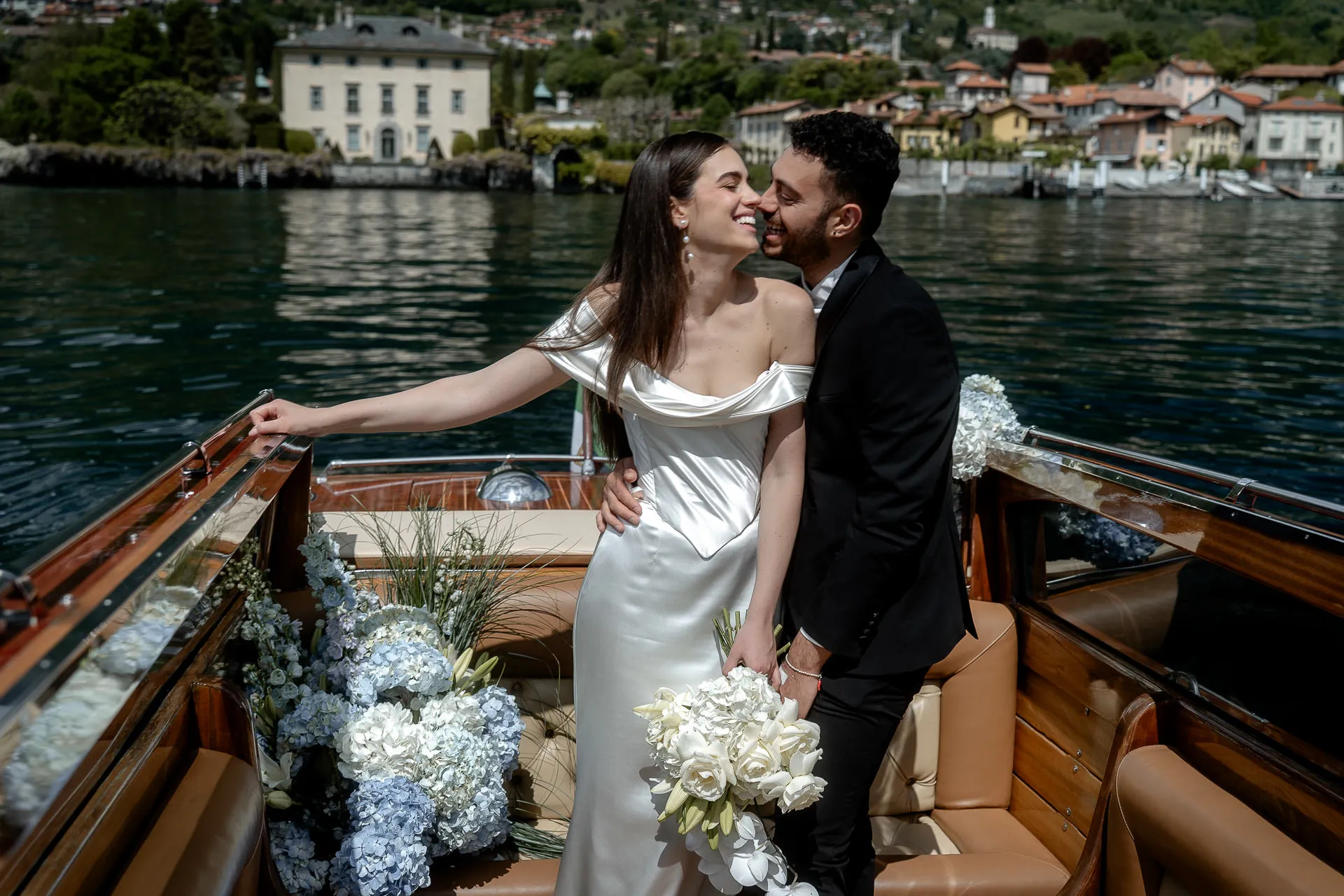 Romantic boat ride wedding couple in luxury motorboat on Lake Como