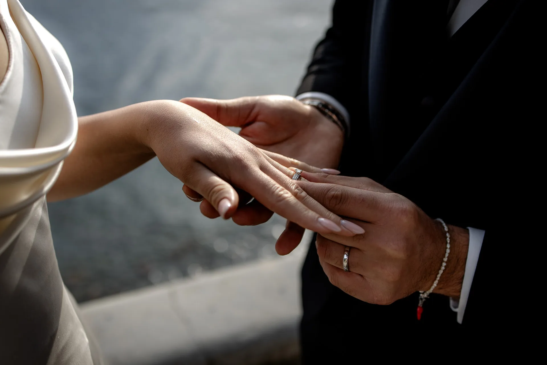 Close-up of ring exchange at Lake Como wedding