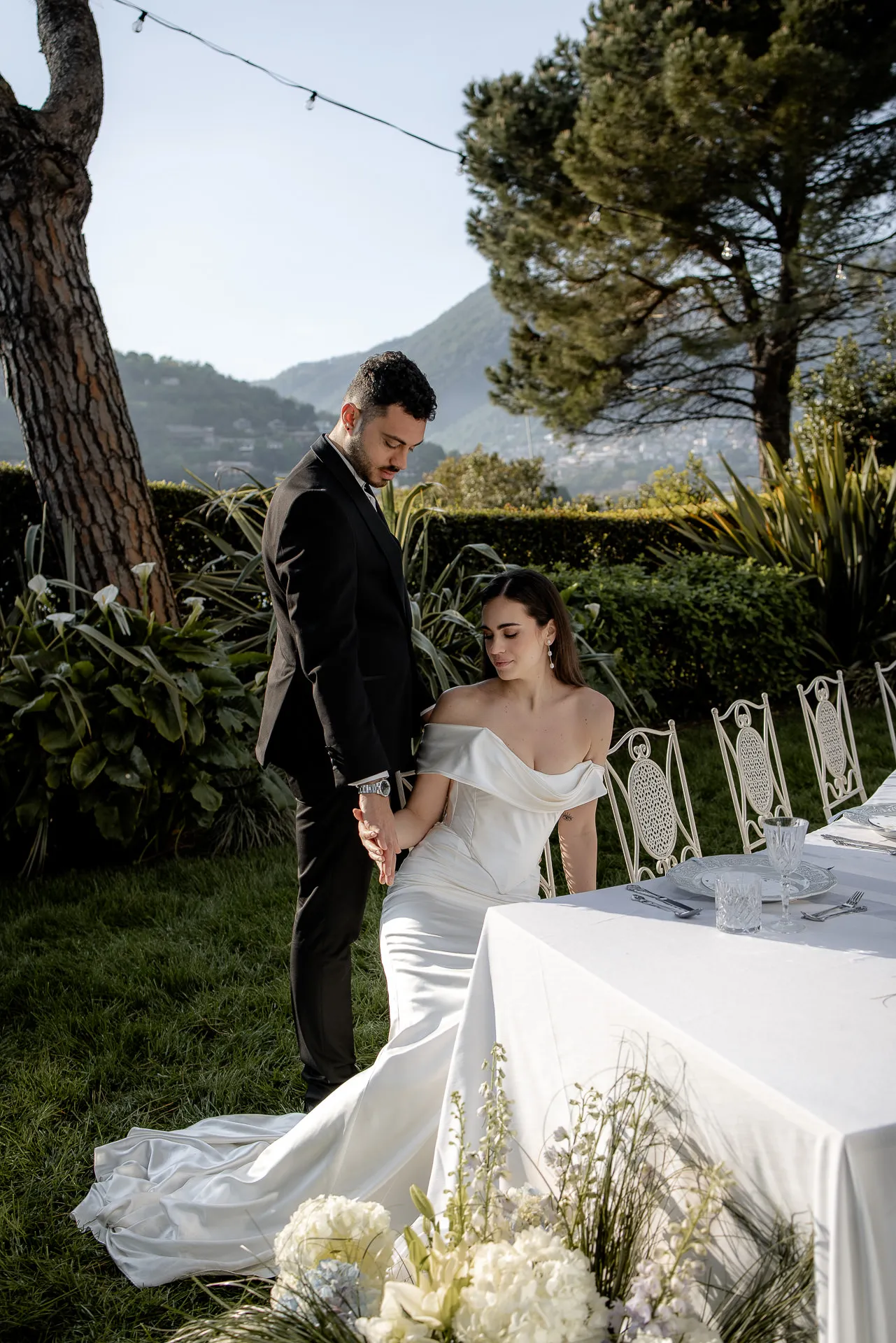 Romantic wedding couple portrait at elegant wedding table at Lake Como