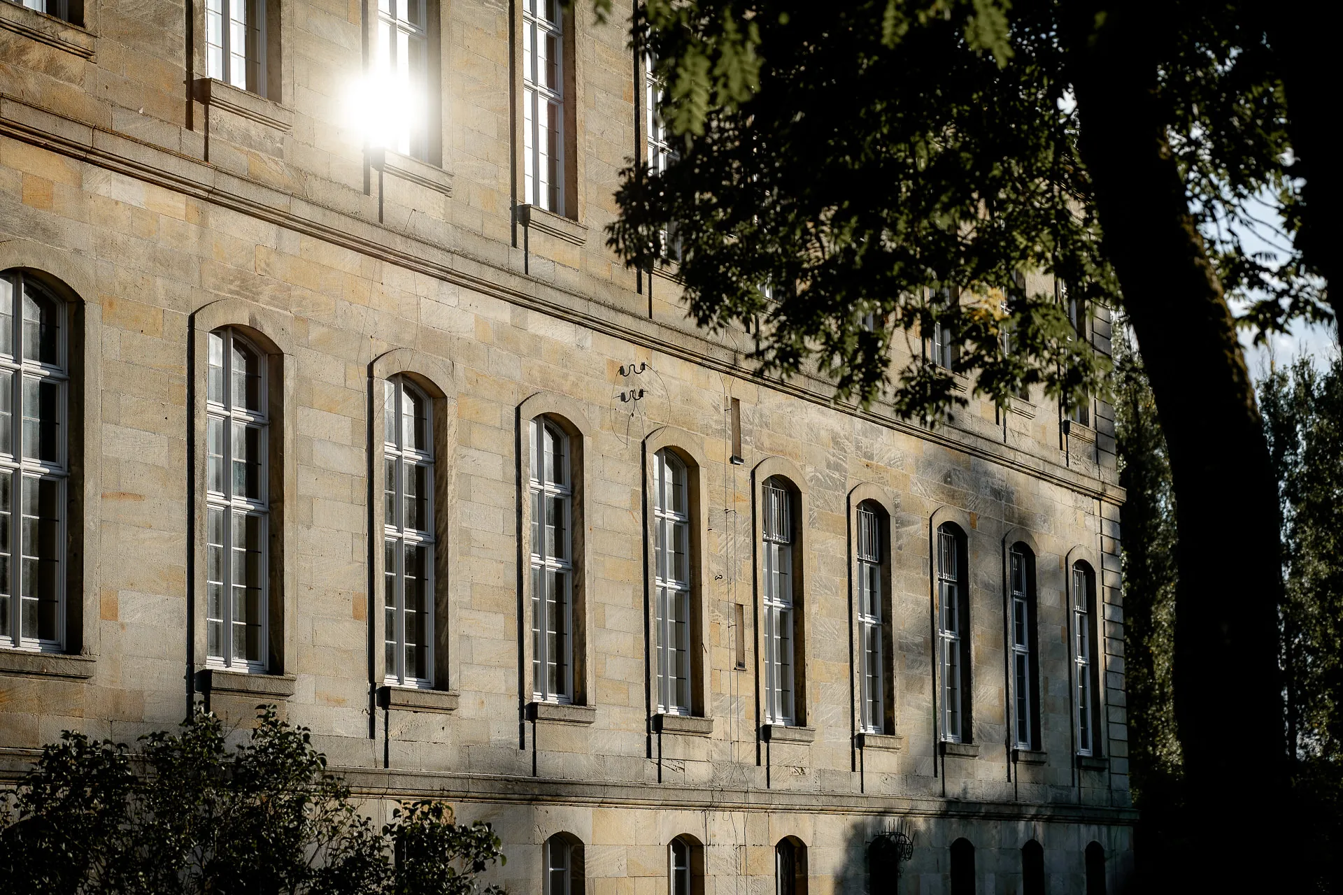 Historic castle facade Eyrichshof in golden light at outdoor wedding