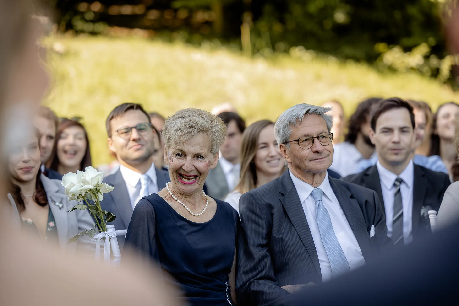 Wedding guests watching ceremony at Lake Starnberg