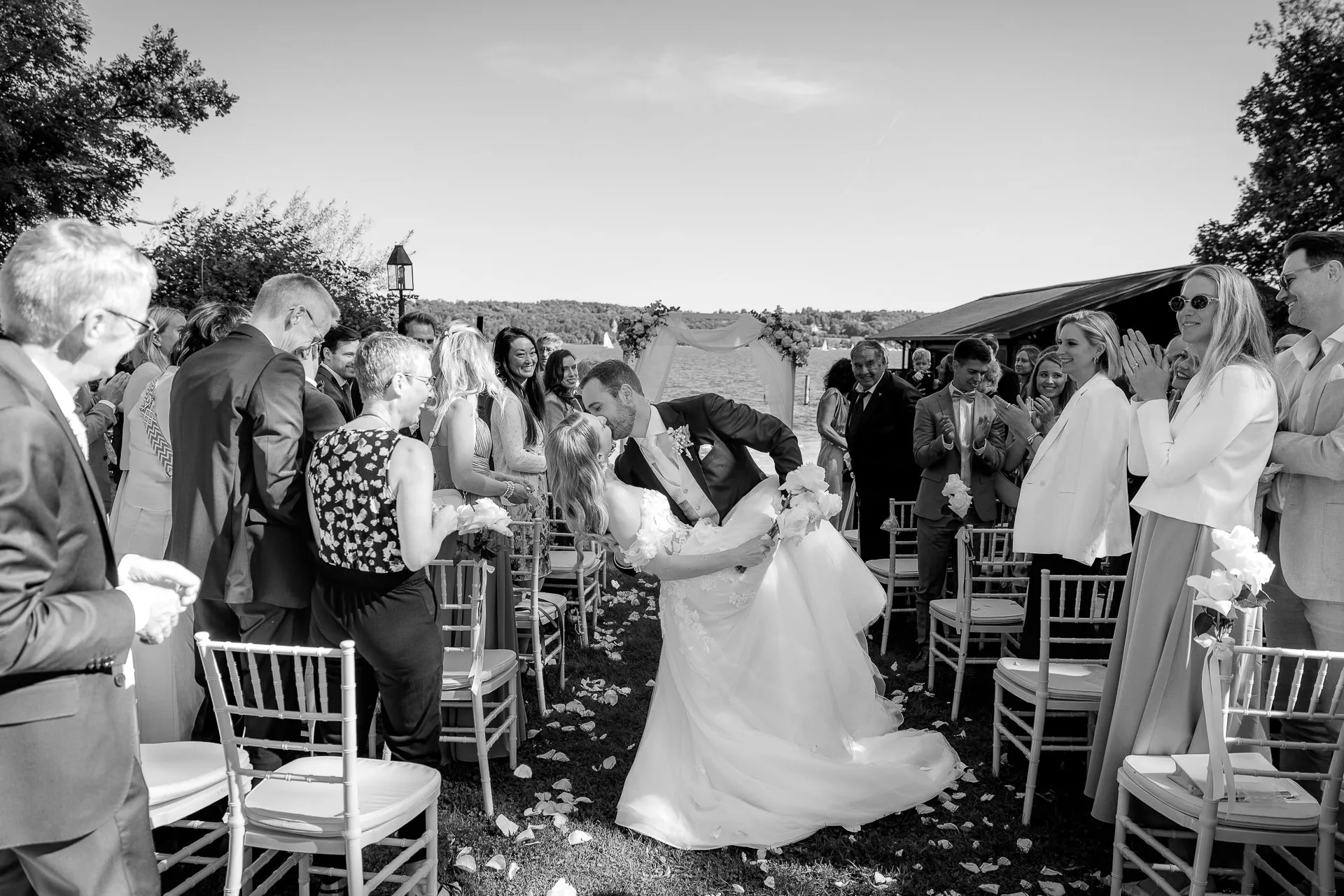 Couple greeting and hugging guests after ceremony