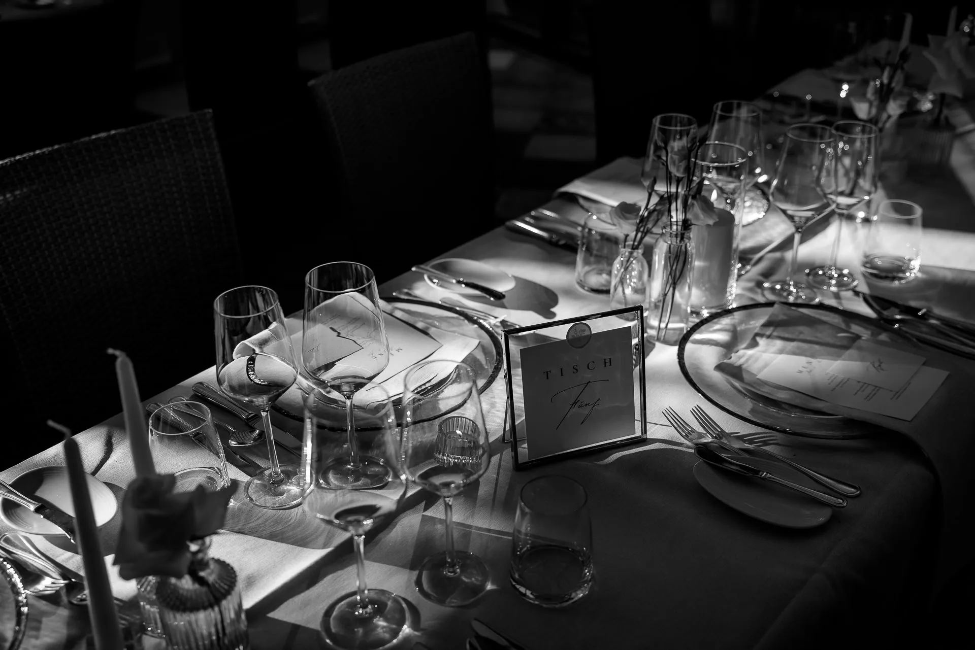 Elegantly set wedding table with table number black and white