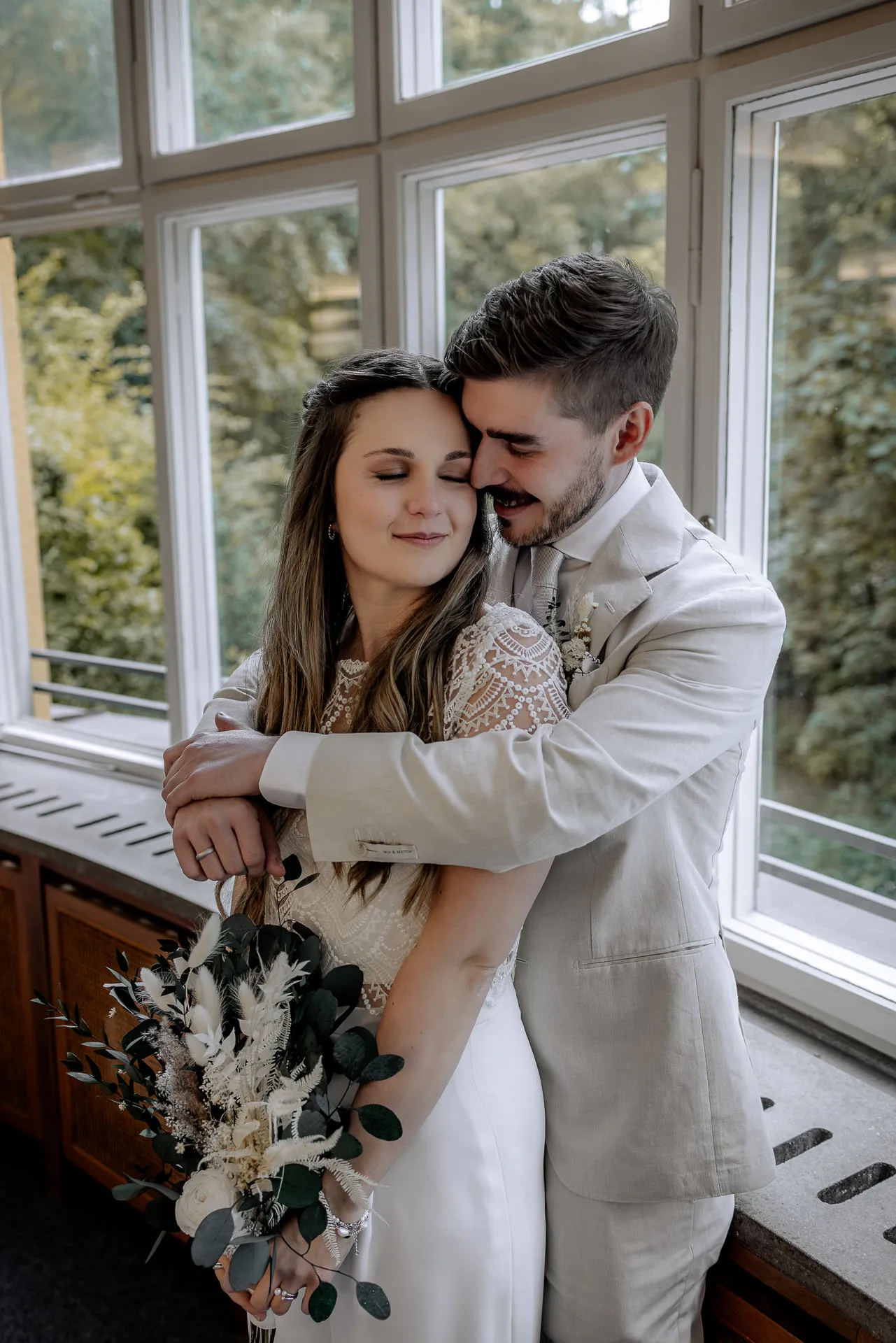 Intimate moment by the window after civil ceremony Munich