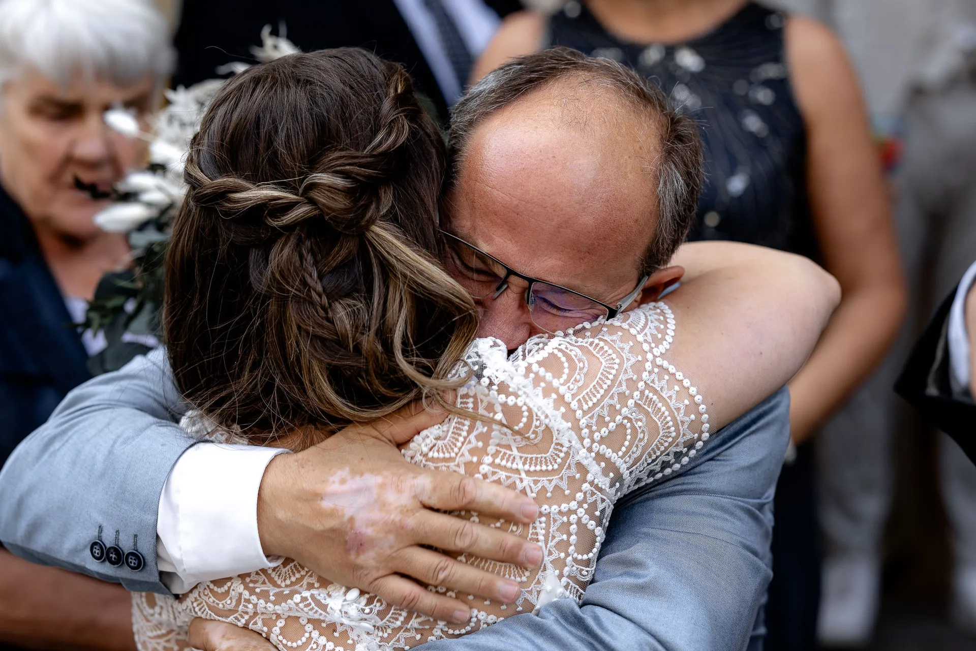 Emotional hug with father of the bride after civil ceremony Munich