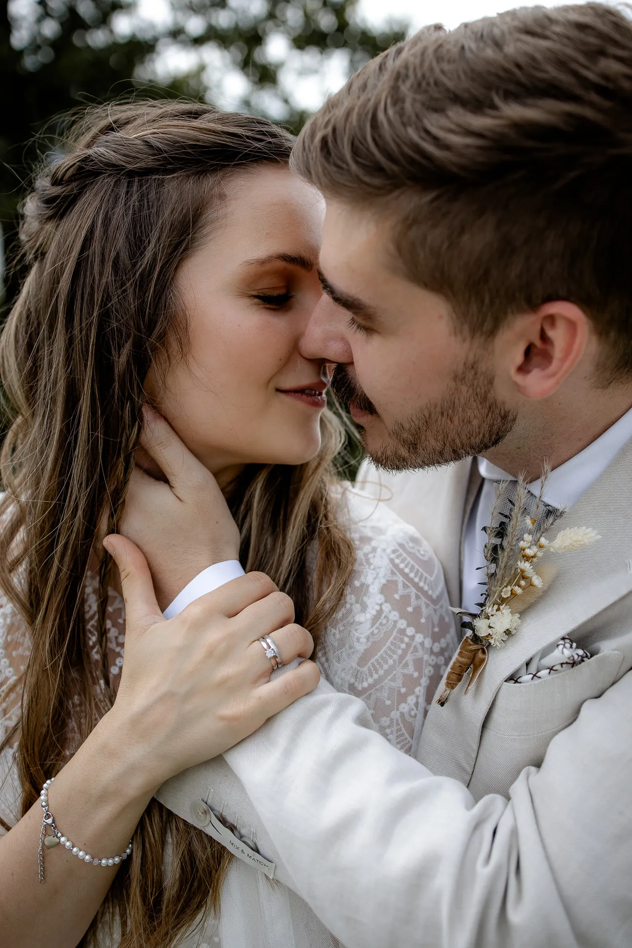 Intimate couple close-up with wedding rings at Lake Tegernsee – emotional wedding photography