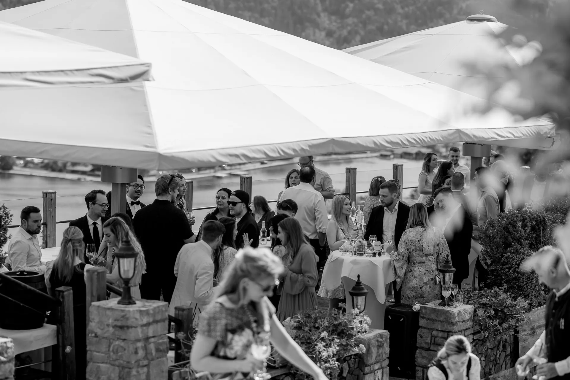 Wedding celebration on terrace at Leeberghof on Lake Tegernsee – elegant wedding photography in black and white