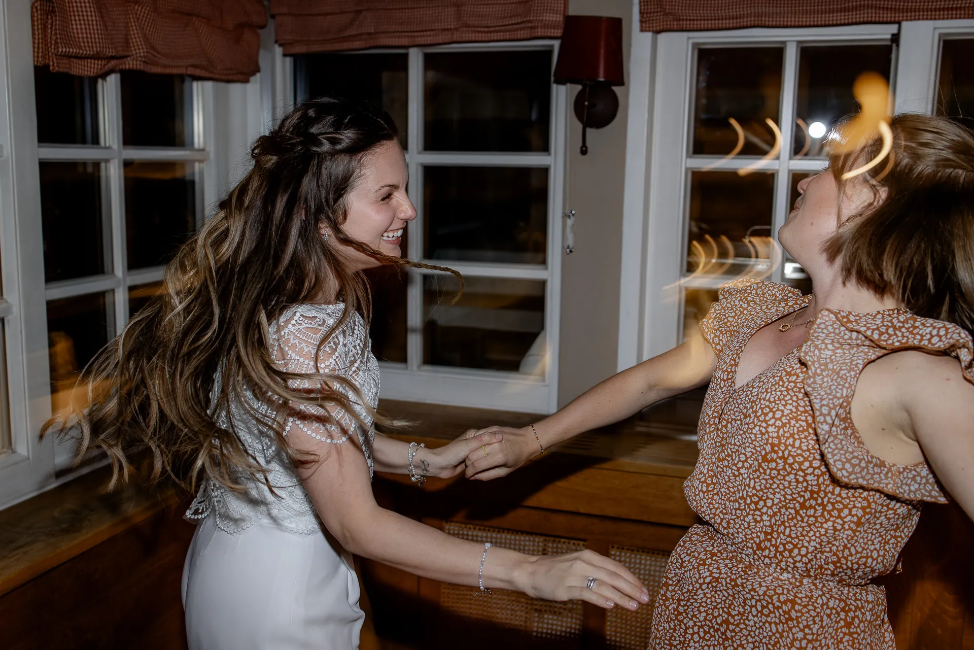 Bride dancing at wedding celebration at Leeberghof – joyful wedding photography