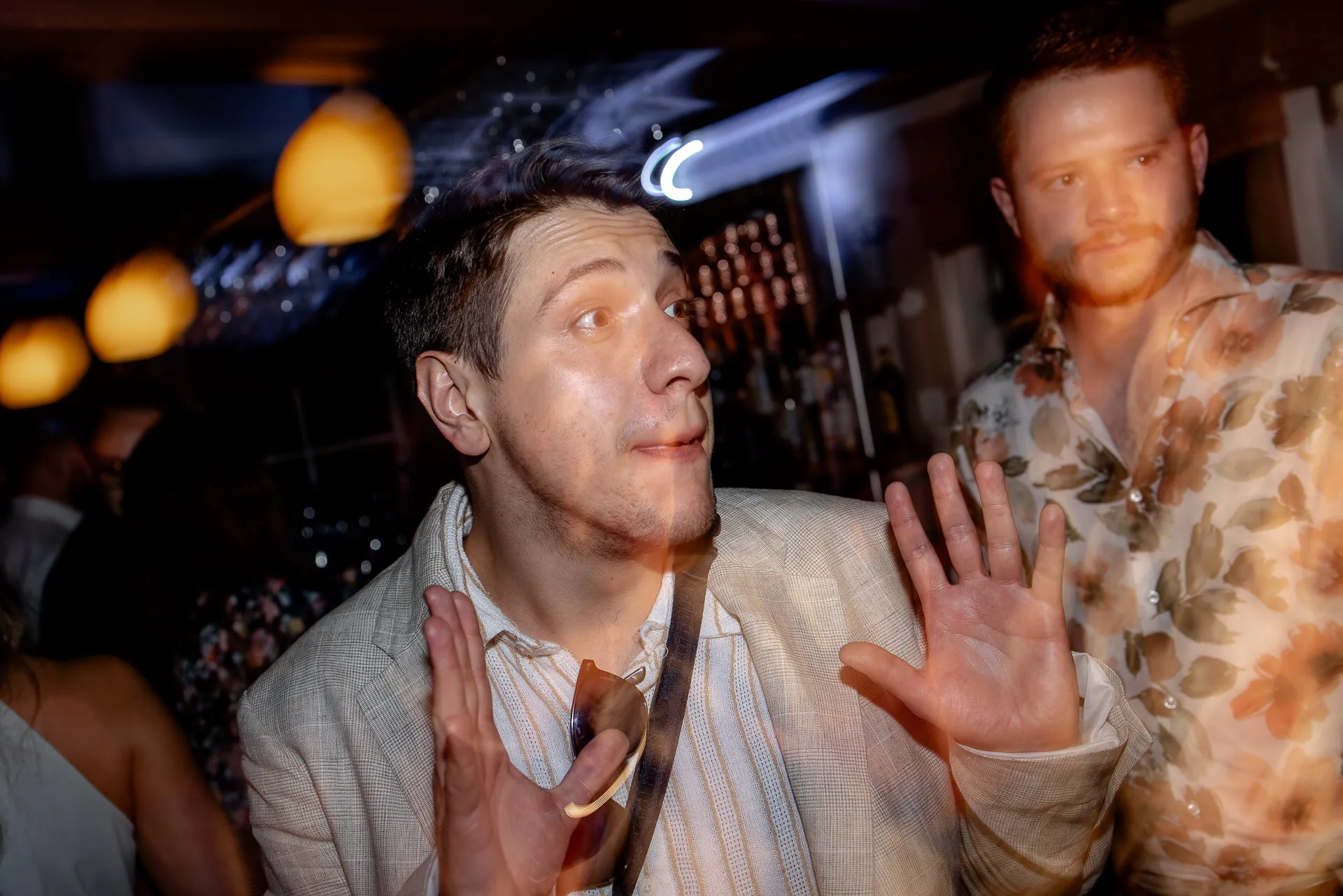 Groom celebrating on dance floor at Leeberghof – vibrant wedding party photography
