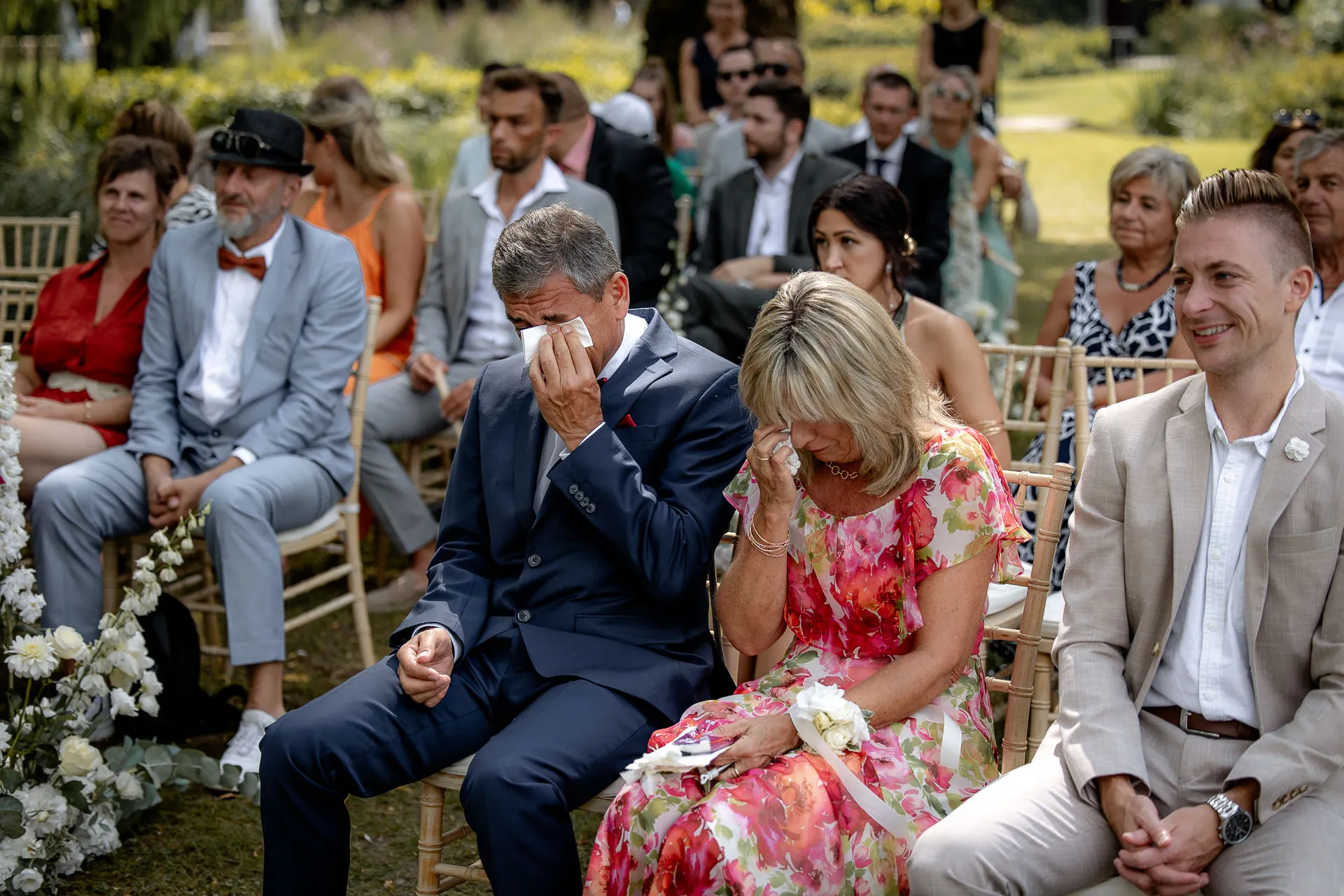 Moved wedding guests crying during emotional ceremony