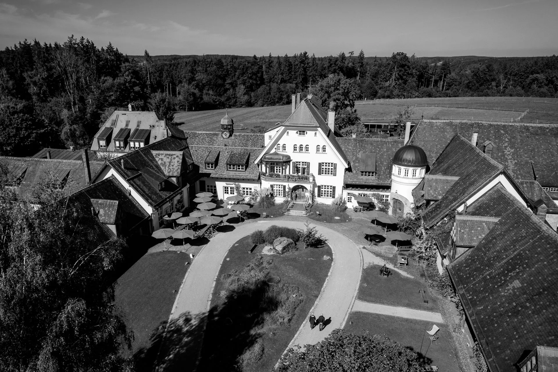 Aerial view of Gut Sonnenhausen wedding venue in black and white with Bavarian estate