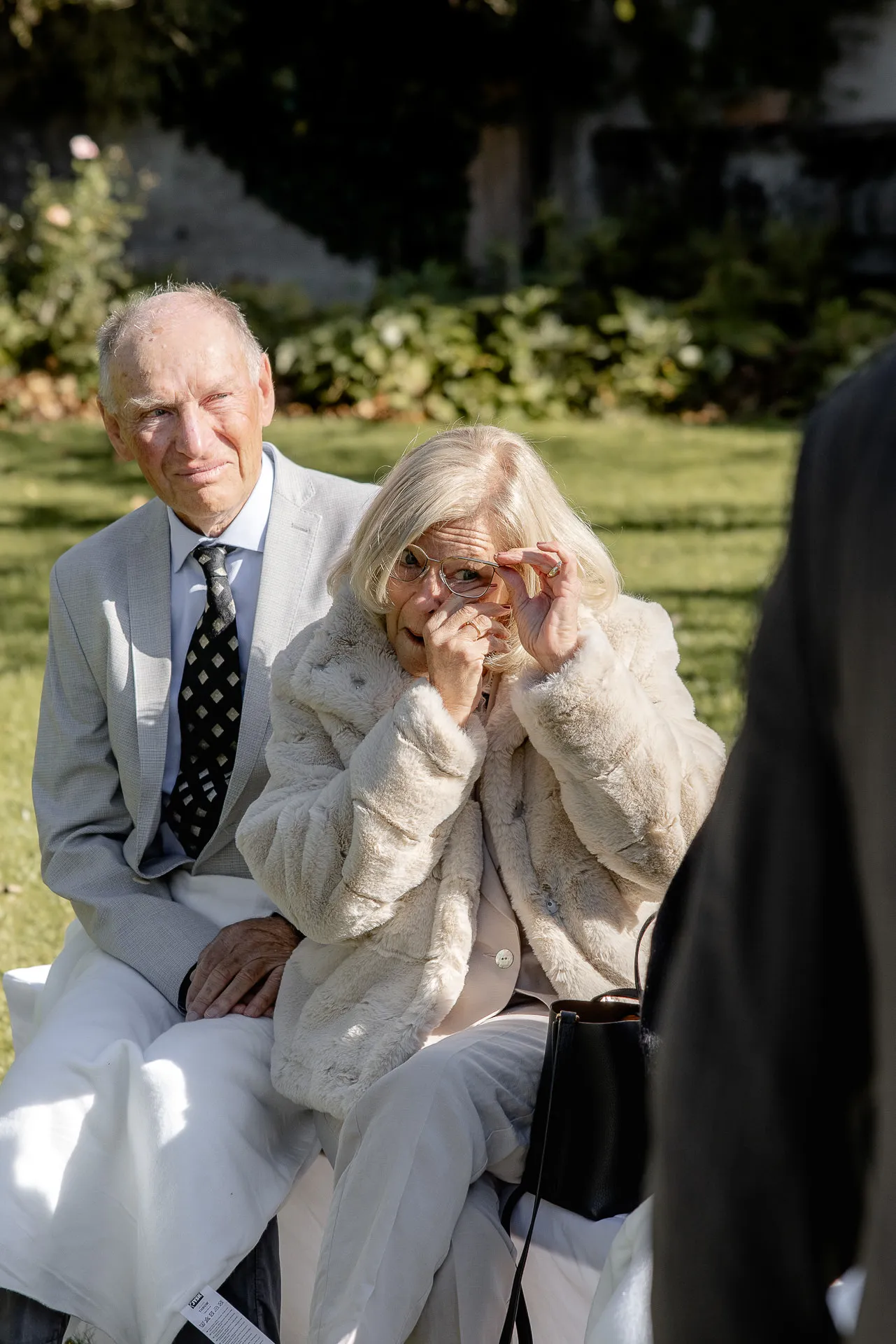 Grandparents crying tears of joy at wedding at Gut Sonnenhausen