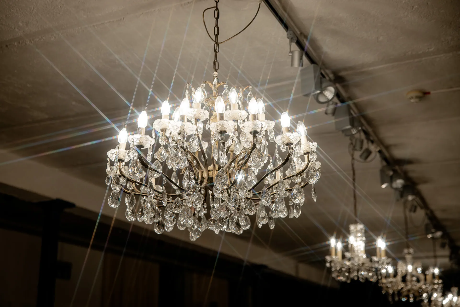 Ornate crystal chandelier at wedding celebration at Gut Sonnenhausen country wedding