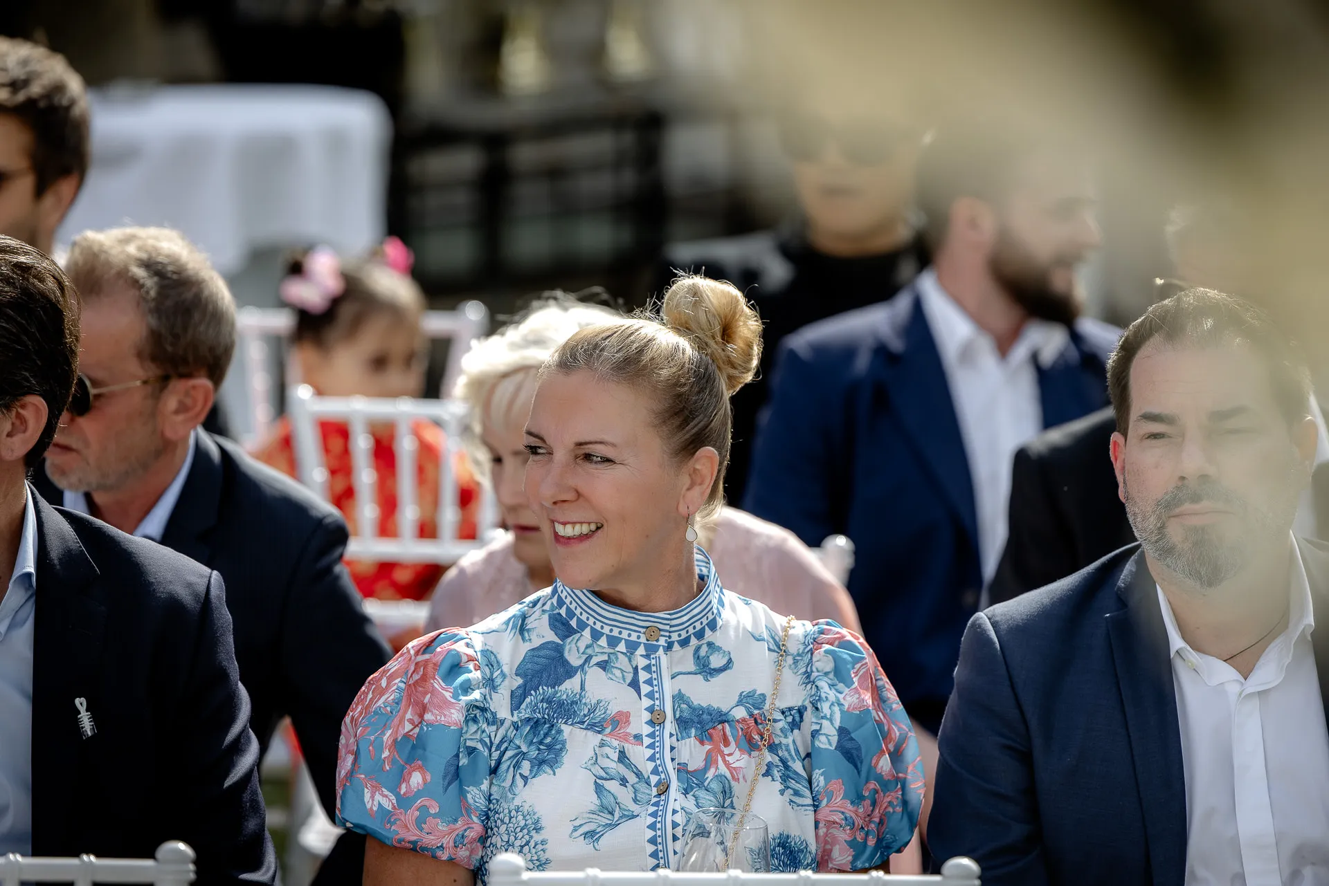 Joyful wedding guests at ceremony at Villa Cariola